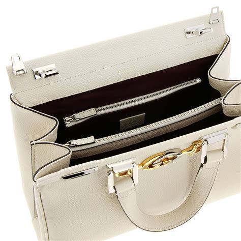 guci guci i dolce gabbana|white gucci handbag.